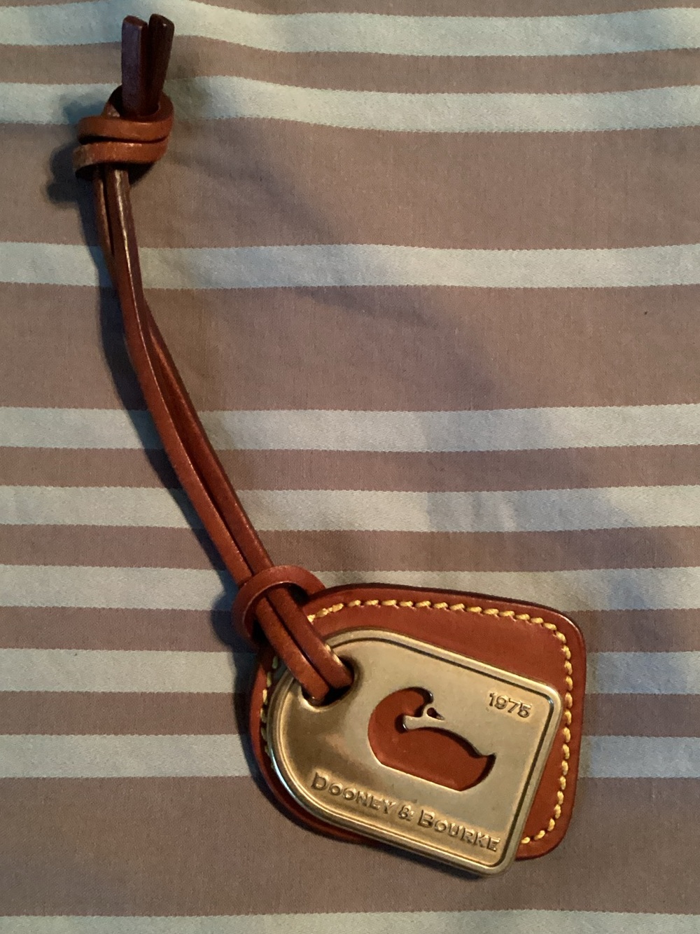 Dooney & Bourke Brown Leather Duck Tag Charm with Brass Plate
